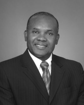 MICHAEL E. ETOMI