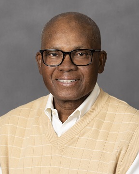 MICHAEL E. ETOMI